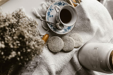 white ceramic mug fill with coffee on white saucer, white teacup filled with black liquid on saucer HD wallpaper