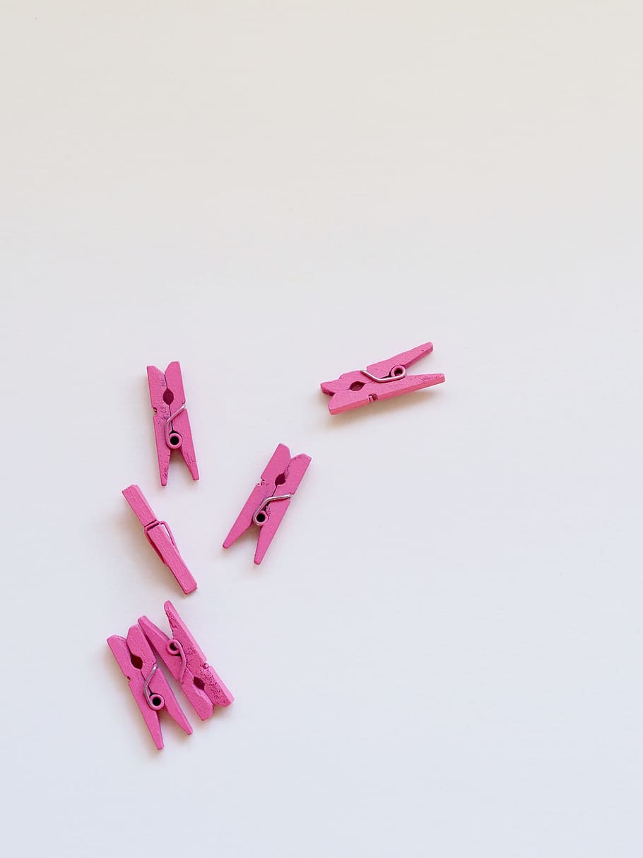 pink clothes clip lot on white surface, pegs, background, white desk, HD wallpaper