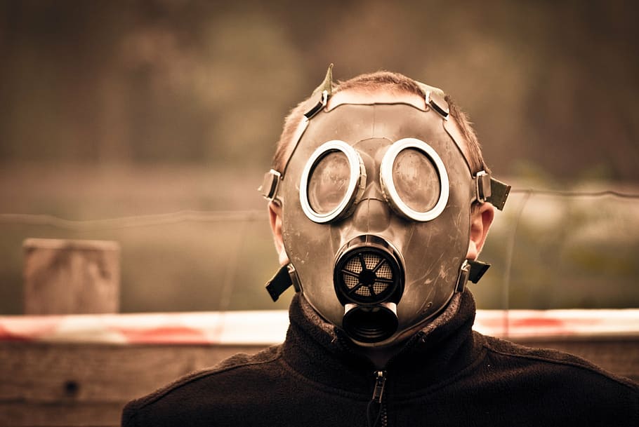 man wearing gas mask, male, boy, young, student, the student