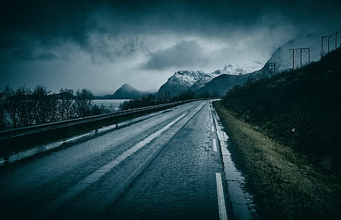 photography of empty roadway near glacier mountains at daytime, grey street in front of mountain HD wallpaper