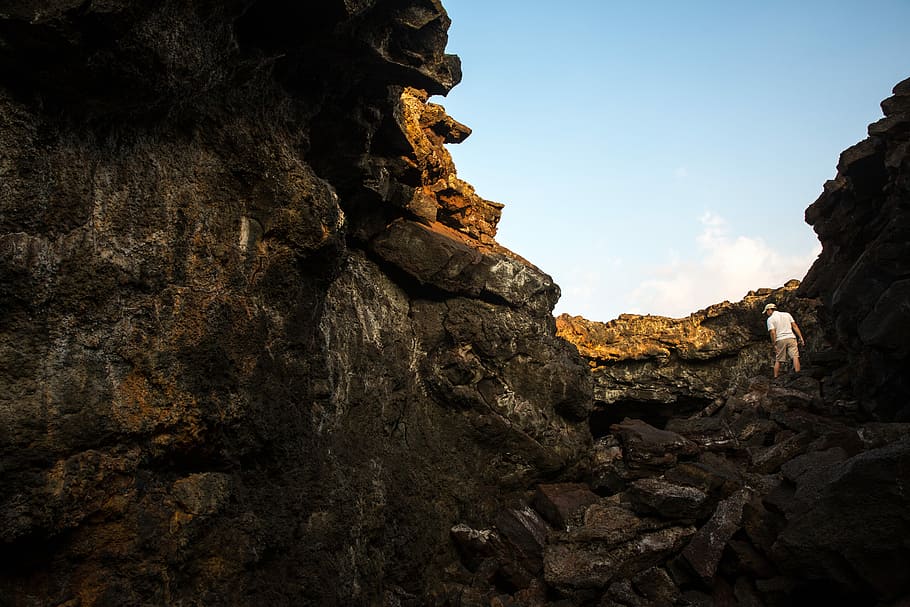 landscape photography of rock formations, explore, man, mountain HD wallpaper