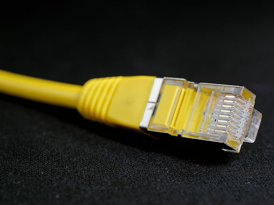 yellow ethernet cable on black surface, network, lan, wire, cork