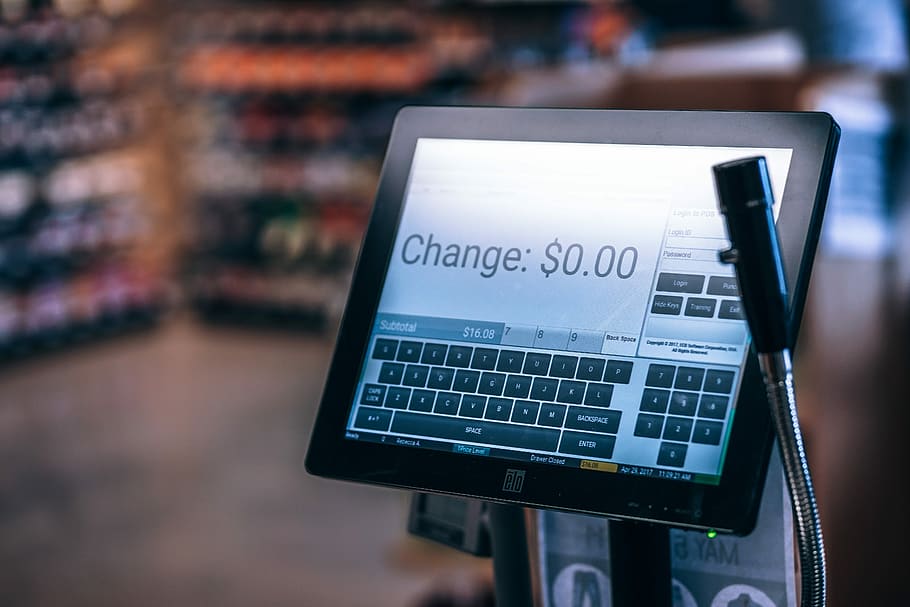 Touchscreen Register, black flat screen cash register monitor displaying at change 0.00 dollars