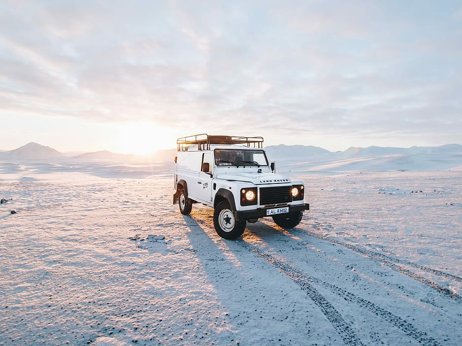 white Land Rover, white SUV on snow coated land, wallpaper, car wallpapers HD wallpaper