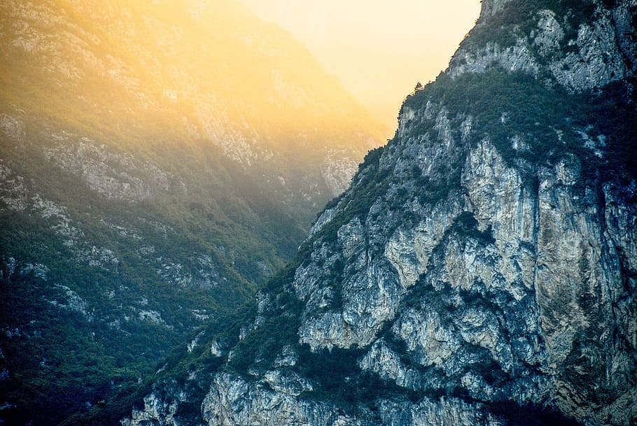 mountains during sunset, range, valley, craggy, rock, light HD wallpaper