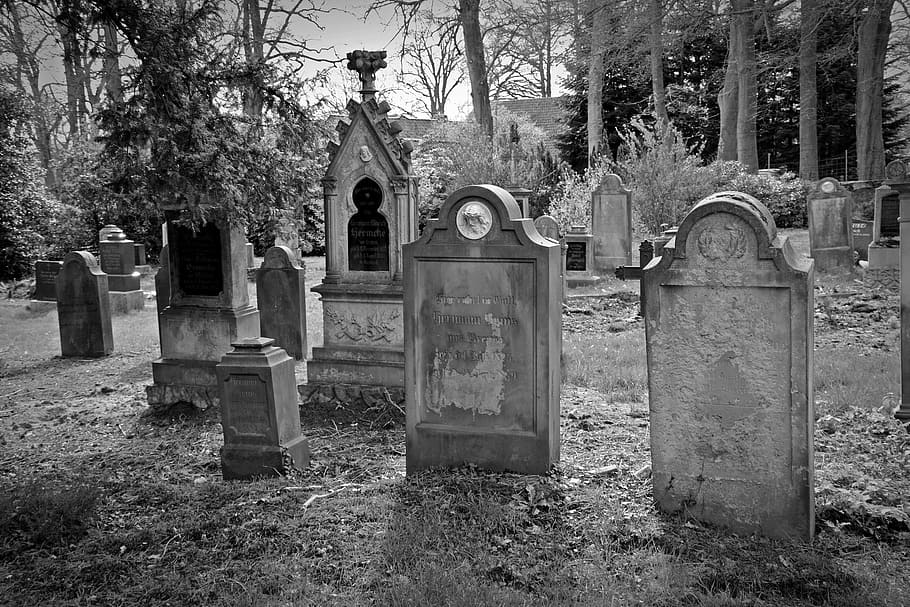grayscale photography of graveyard, tombstone, old grave stones
