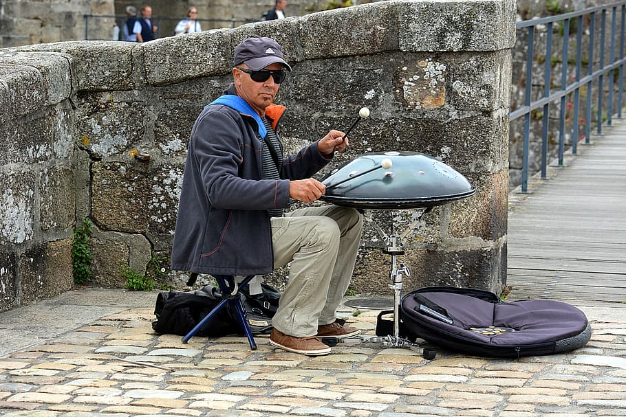 man sitting in front of musical instrument, street musician, artist, HD wallpaper