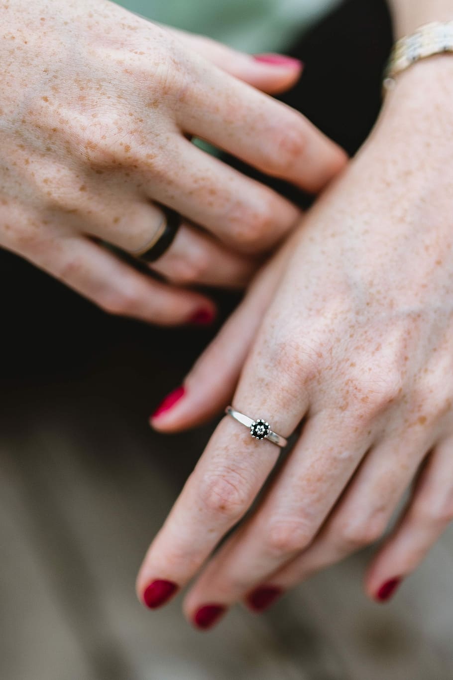 Detail of woman's hands and jewelry, female, jewellery, jewelery