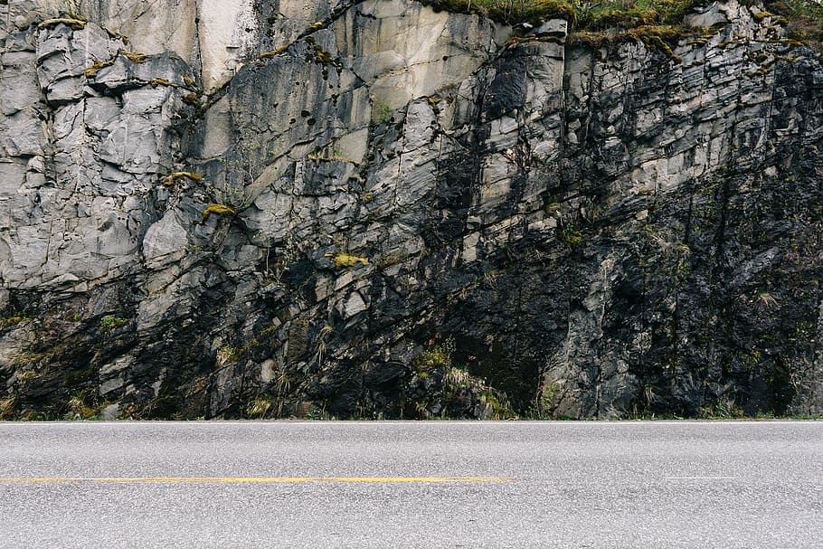 empty concrete road near gray mountain, stone, cliff, beside HD wallpaper