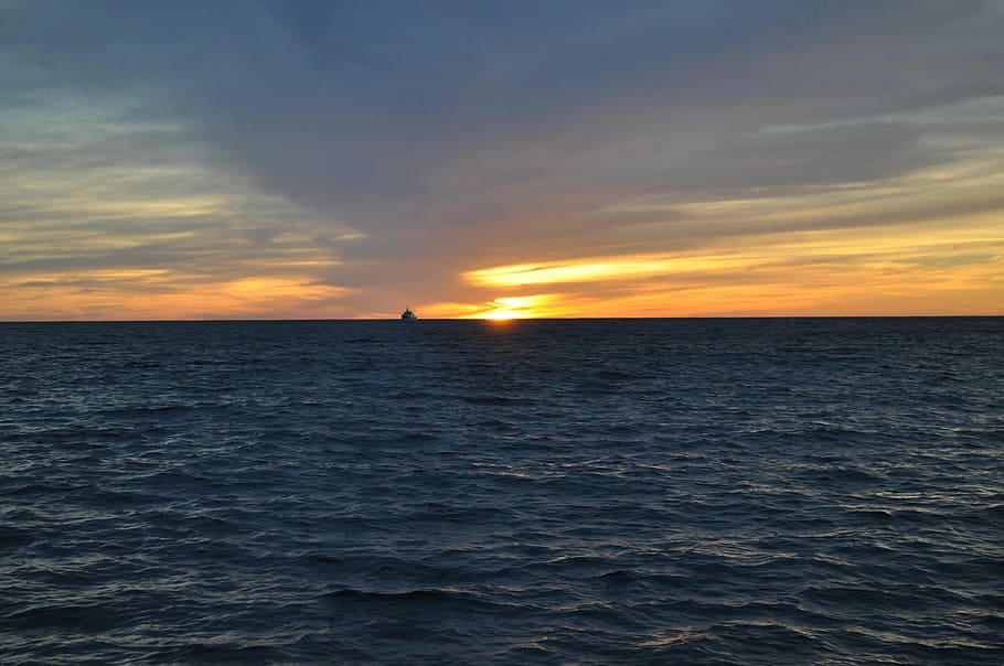 sunset, cape, boat, sun sunset, calm sea, ocean, sky, water HD wallpaper