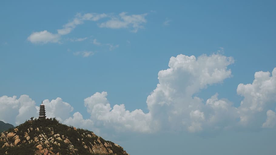 white clouds over black pagoda during daytime, lighthouse on hill taken at daytime HD wallpaper