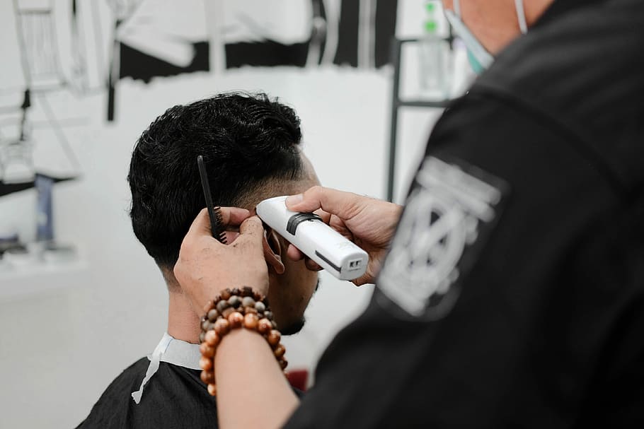 man holding white hair trimmer, man razoring another man's hair, HD wallpaper
