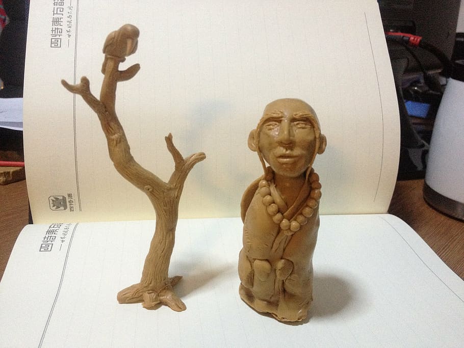 clay sculpture, tree, buddhist monk, human representation, male likeness HD wallpaper