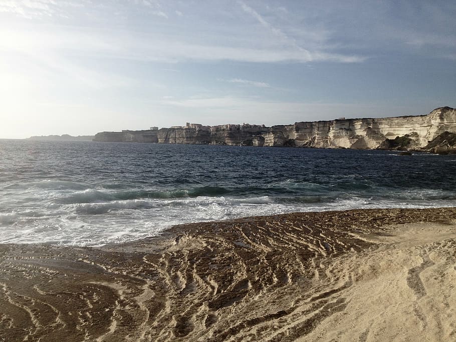 white cliff near body of water during daytime, gray, sand, beach HD wallpaper