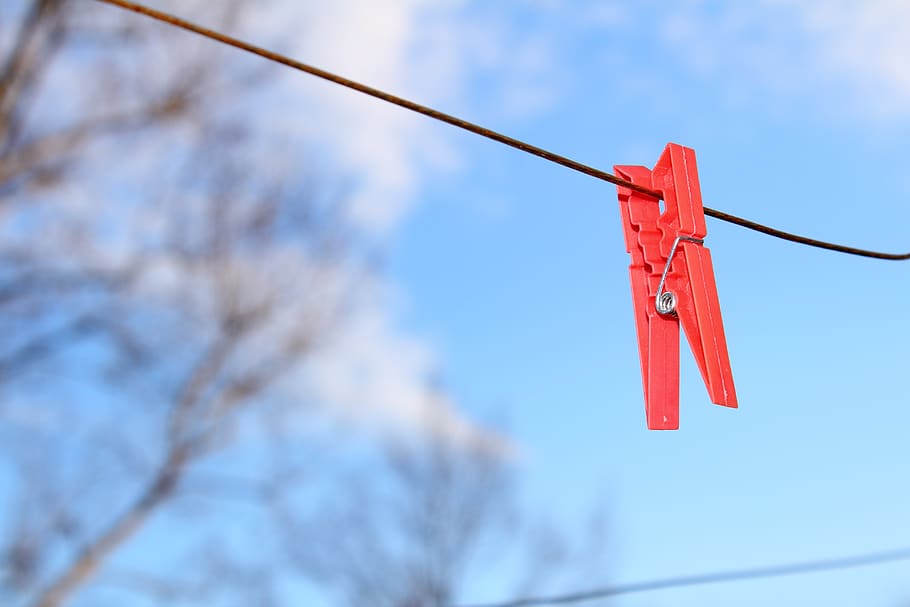 rope, hanging, clothespin, clothes line, outdoors, low angle view