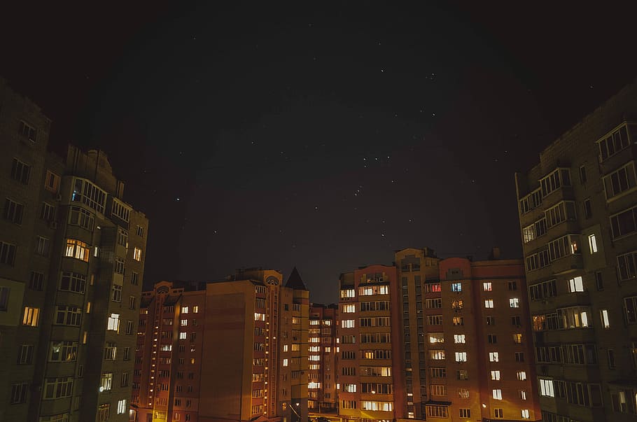 brown and grey painted high-rise building photography during night time HD wallpaper