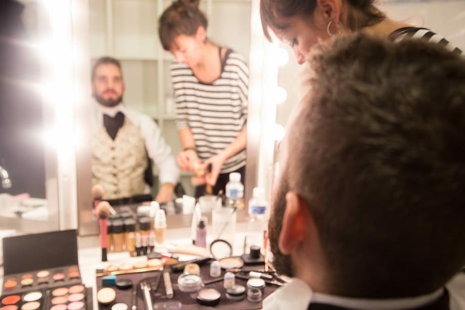 man in front of mirror sitting beside the woman, makeup, wedding HD wallpaper