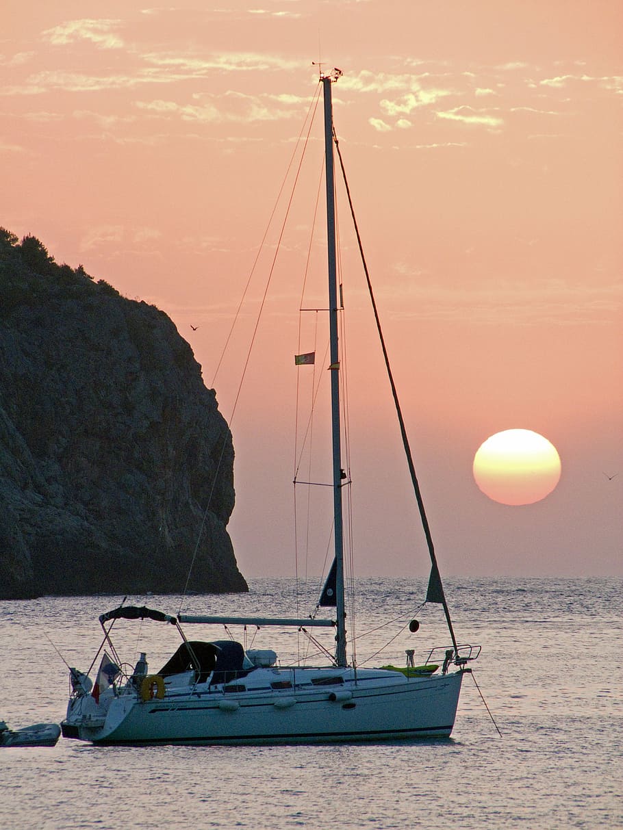 white sailboat in ocean near island, sunset, mallorca, sea, boot, HD wallpaper
