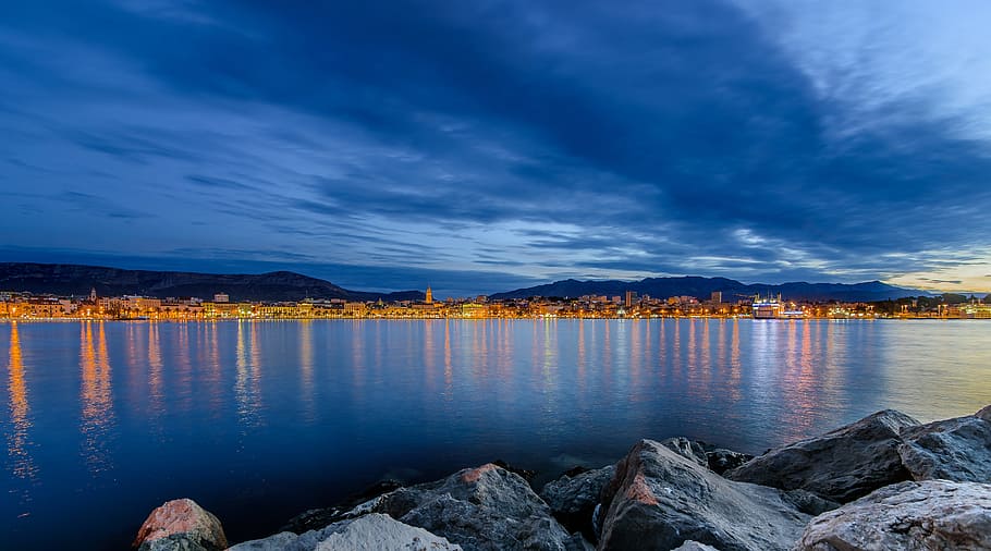 light, sea, city, dawn, beach, blue hour, clouds, dusk, evening HD wallpaper