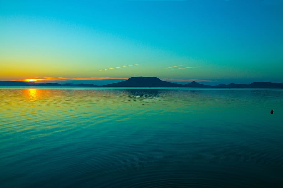 blue body of water and silhouette mountains, nobody, sunset, day s, HD wallpaper