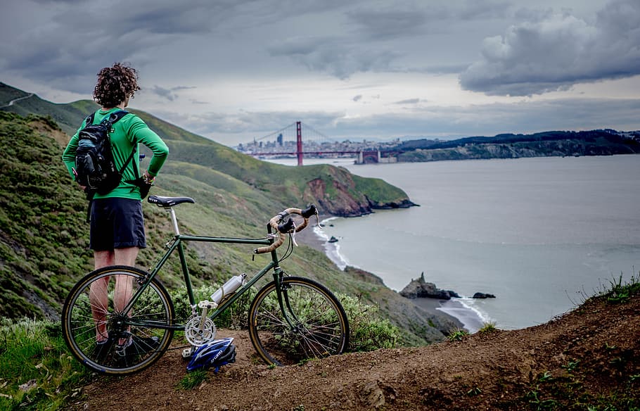 man, bicycle, back, guy, people, alone, highlands, water, sea HD wallpaper