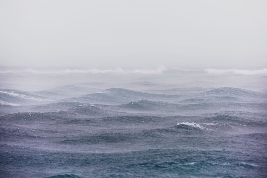 body of water under stratocumulus clouds, ocean waves, Fading