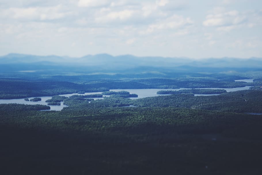 aerial view of foggy mountain, photo of mountains and body of water HD wallpaper