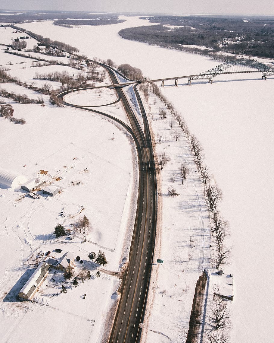 aerial view of road surrounded by white snows, bird's eye view of road HD wallpaper