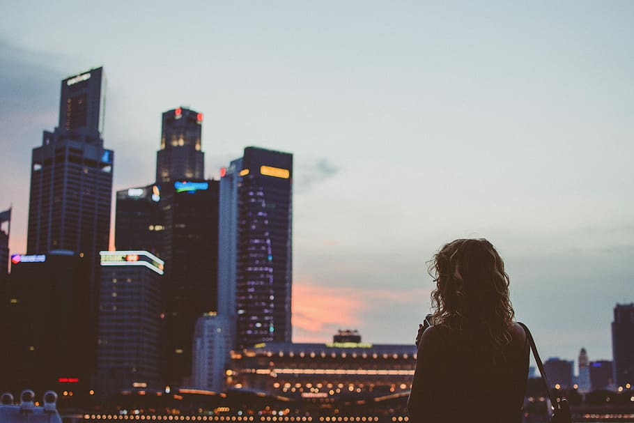 woman looking at the buildings, woman looking at the distance towards high-rise buildings HD wallpaper