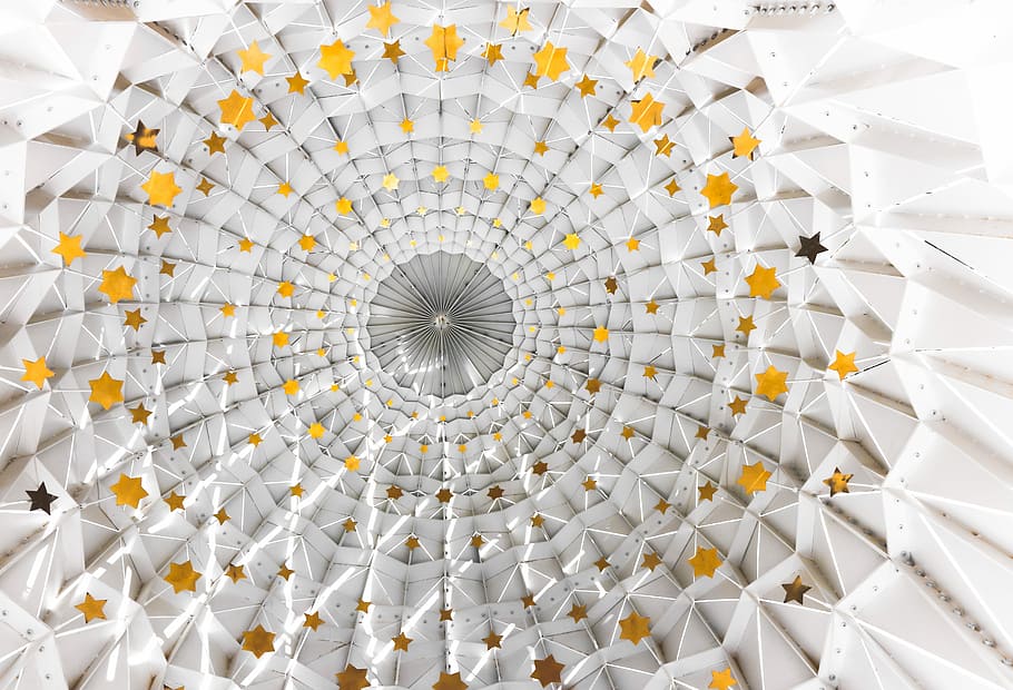 low angle photography of white and yellow dome, architectural photography of white and yellow star print ceiling HD wallpaper
