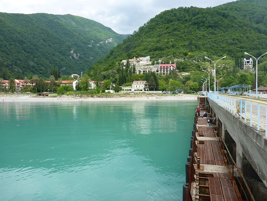 sea, mountains, bridge, pierce, landscape, clouds, sky, summer HD wallpaper