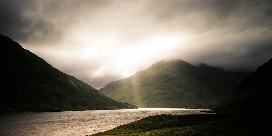 photo of mountains near on body of water, silhouette of mountain beside river HD wallpaper