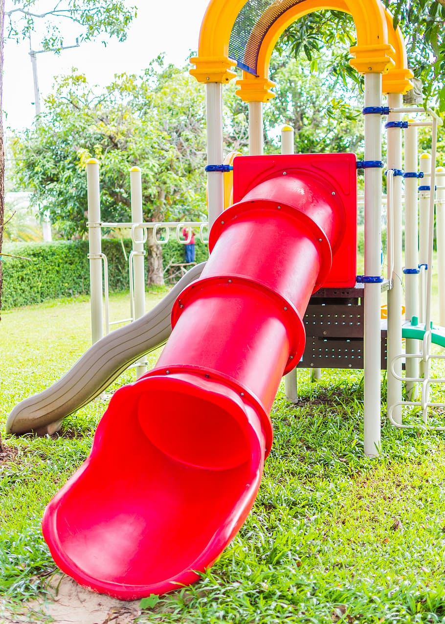 HD wallpaper red and white slide playset on green grass playground park   Wallpaper Flare