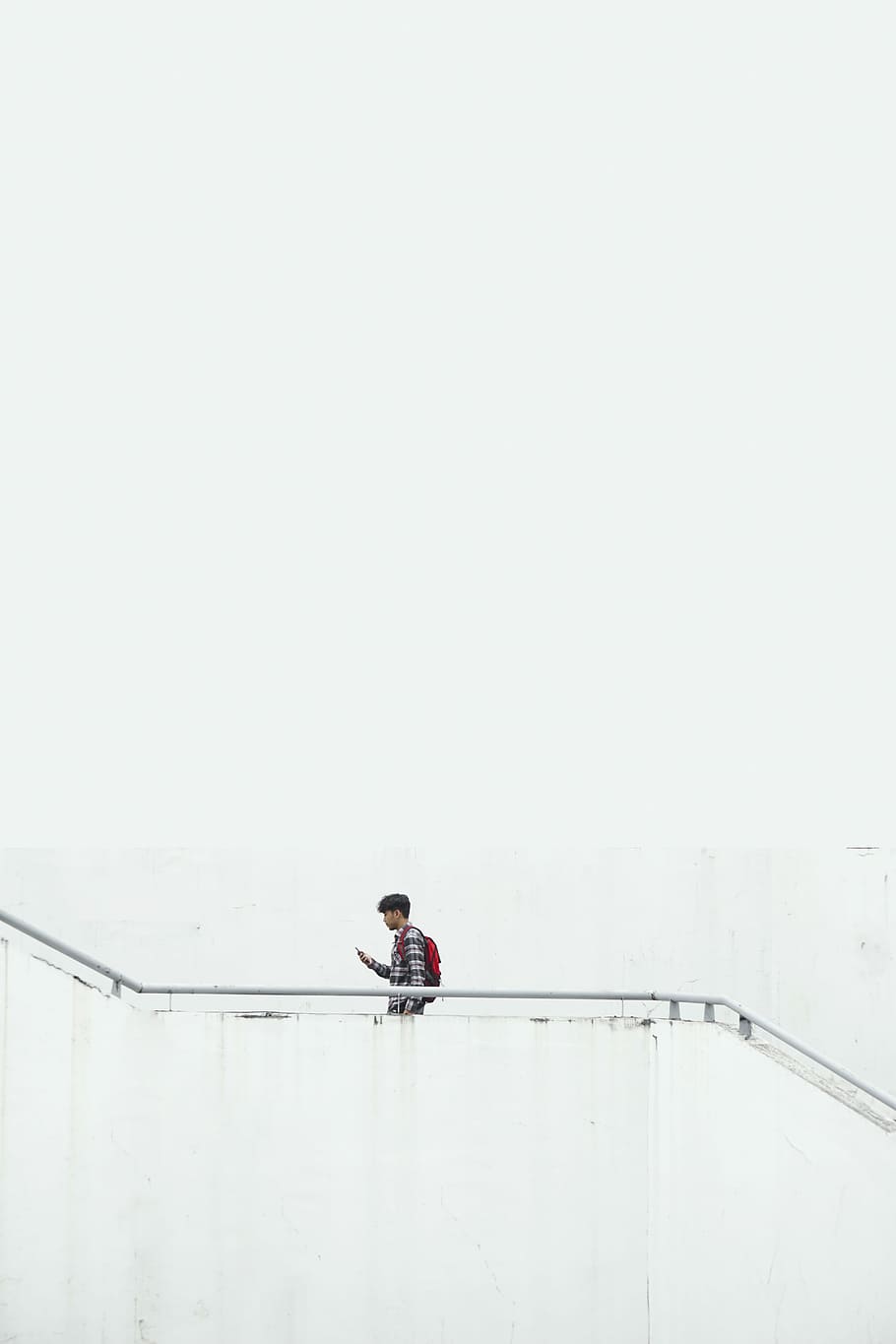 man on stair wearing red backpack, man wearing backpack on stair HD wallpaper