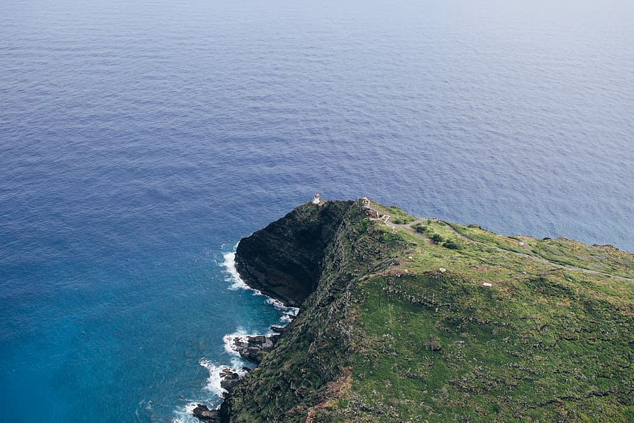 aerial view of island, aerial view photography of cliff during daytime HD wallpaper
