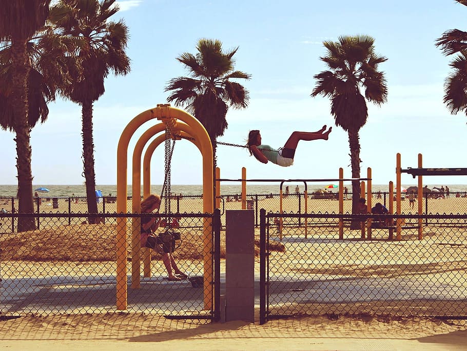Woman Playing Swing Near Beach, Beach park, california, fun, fun time
