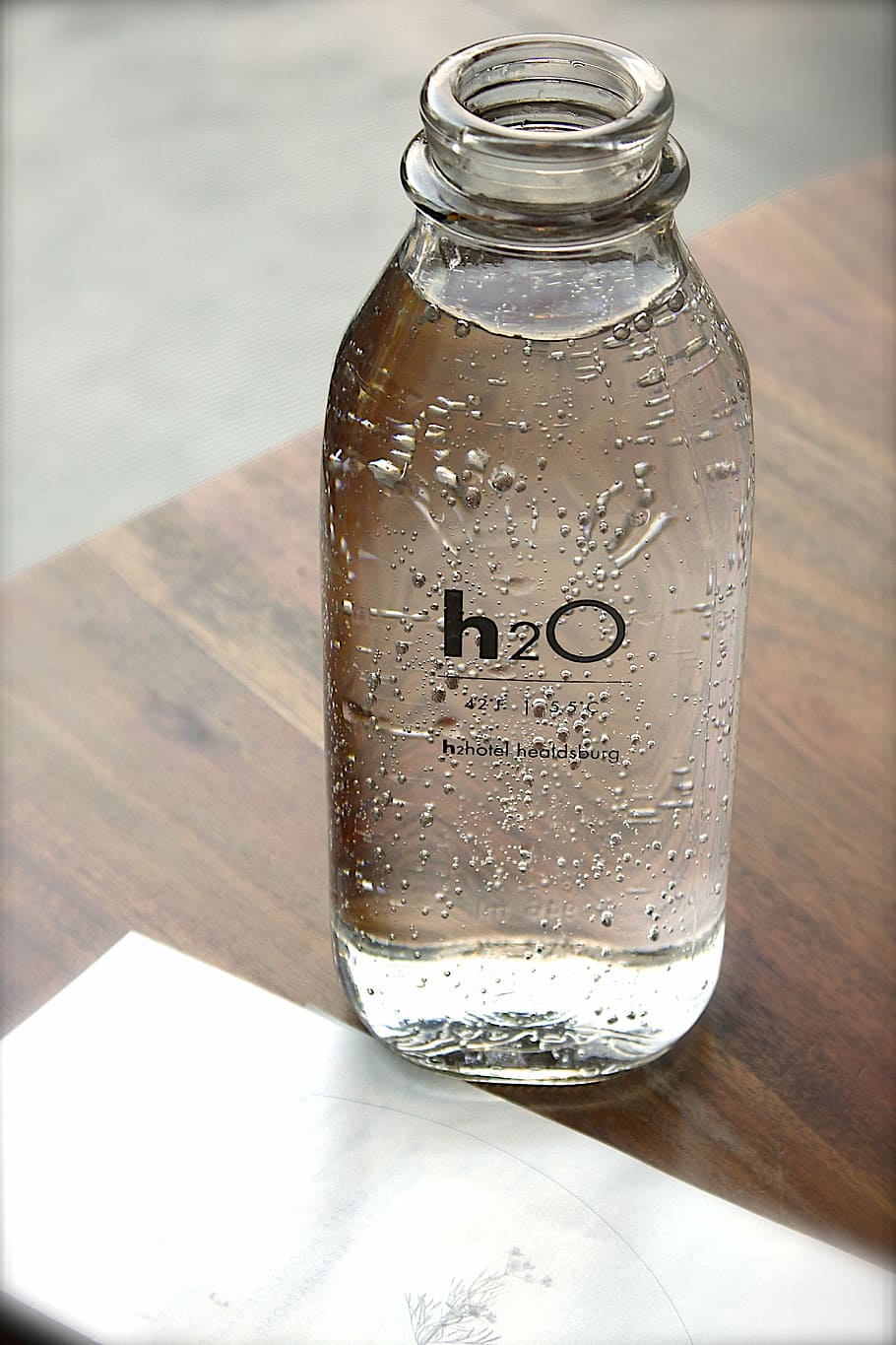 full H2O bottle, glass, water, text, table, indoors, liquid HD wallpaper