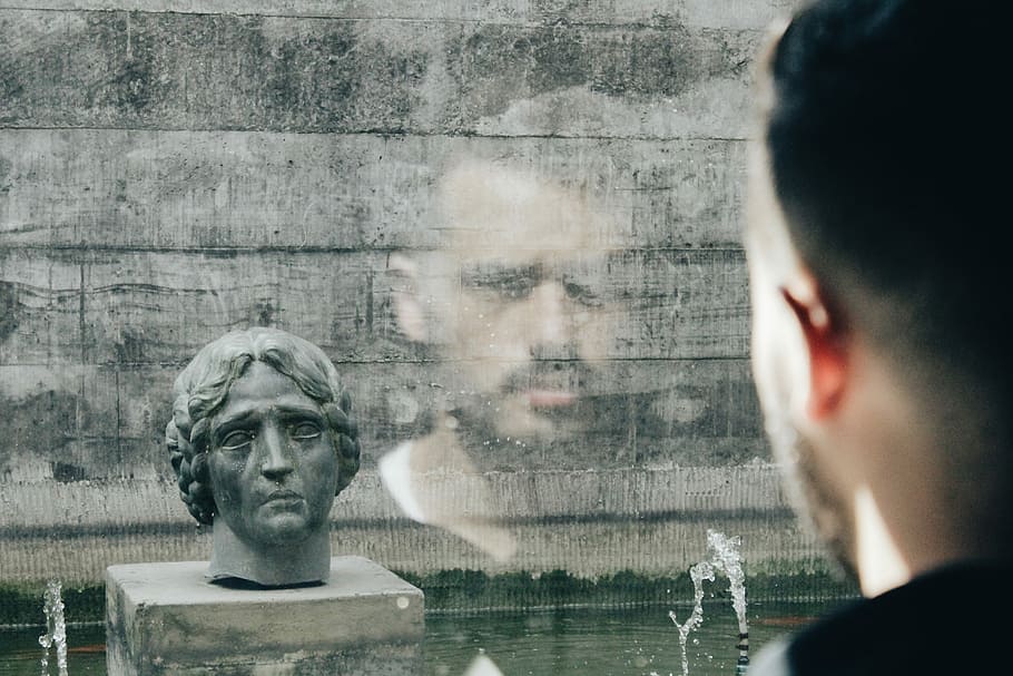 man facing head bust, man looking on gray concrete headbust, face HD wallpaper