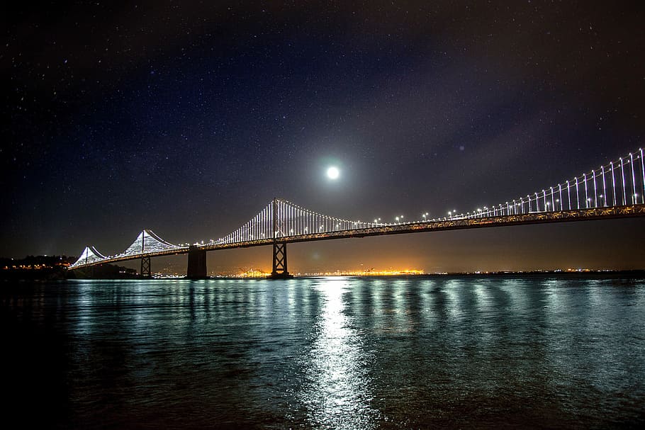 Moon and Stars over the Oakland-San Francisco Bay Bridge at night in California