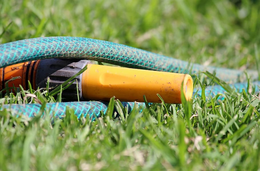 selective focus photography of yellow and gray hose nozzle HD wallpaper