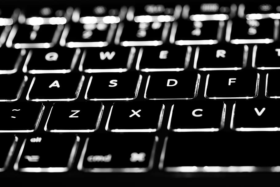 Macro shot of the backlit keyboard of a laptop, image captured with a Canon DSLR and 100m macro lens HD wallpaper