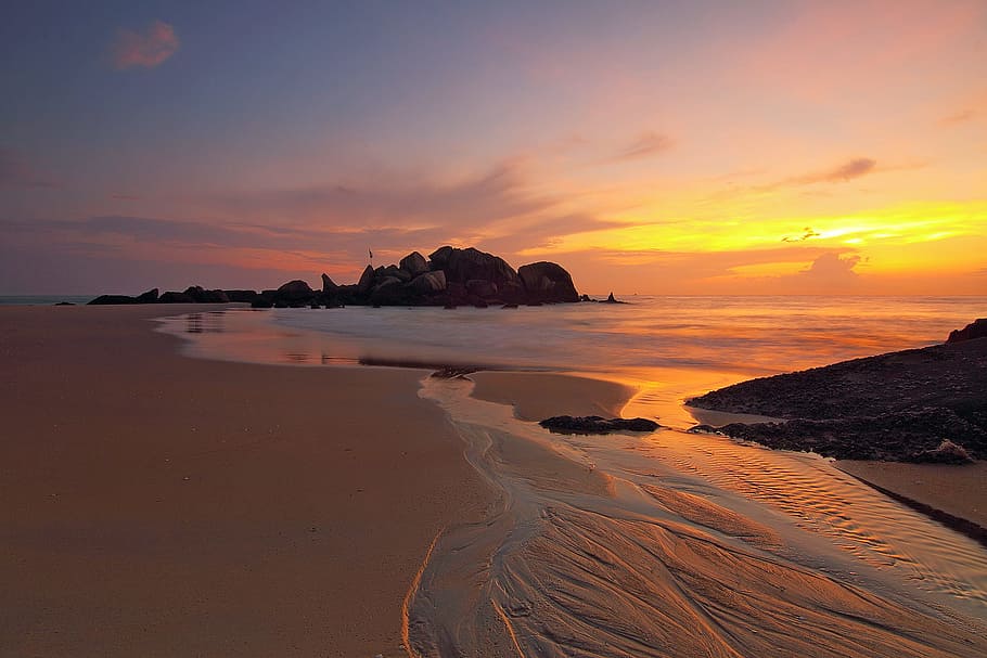 Body of Water Near Brown Mountain during Sunset, beach, dawn HD wallpaper