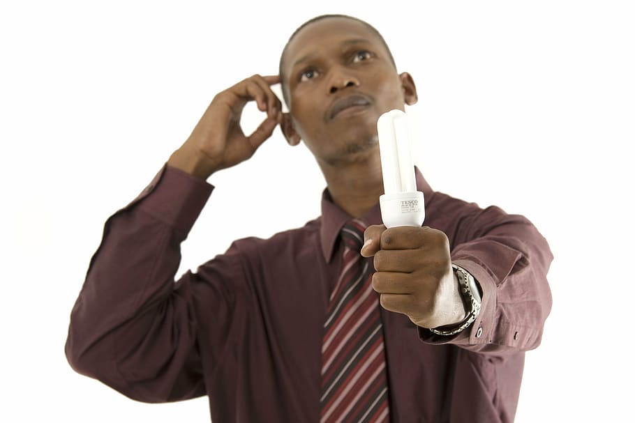 man holding light bulb, african, idea, light bulg, electric bulb HD wallpaper