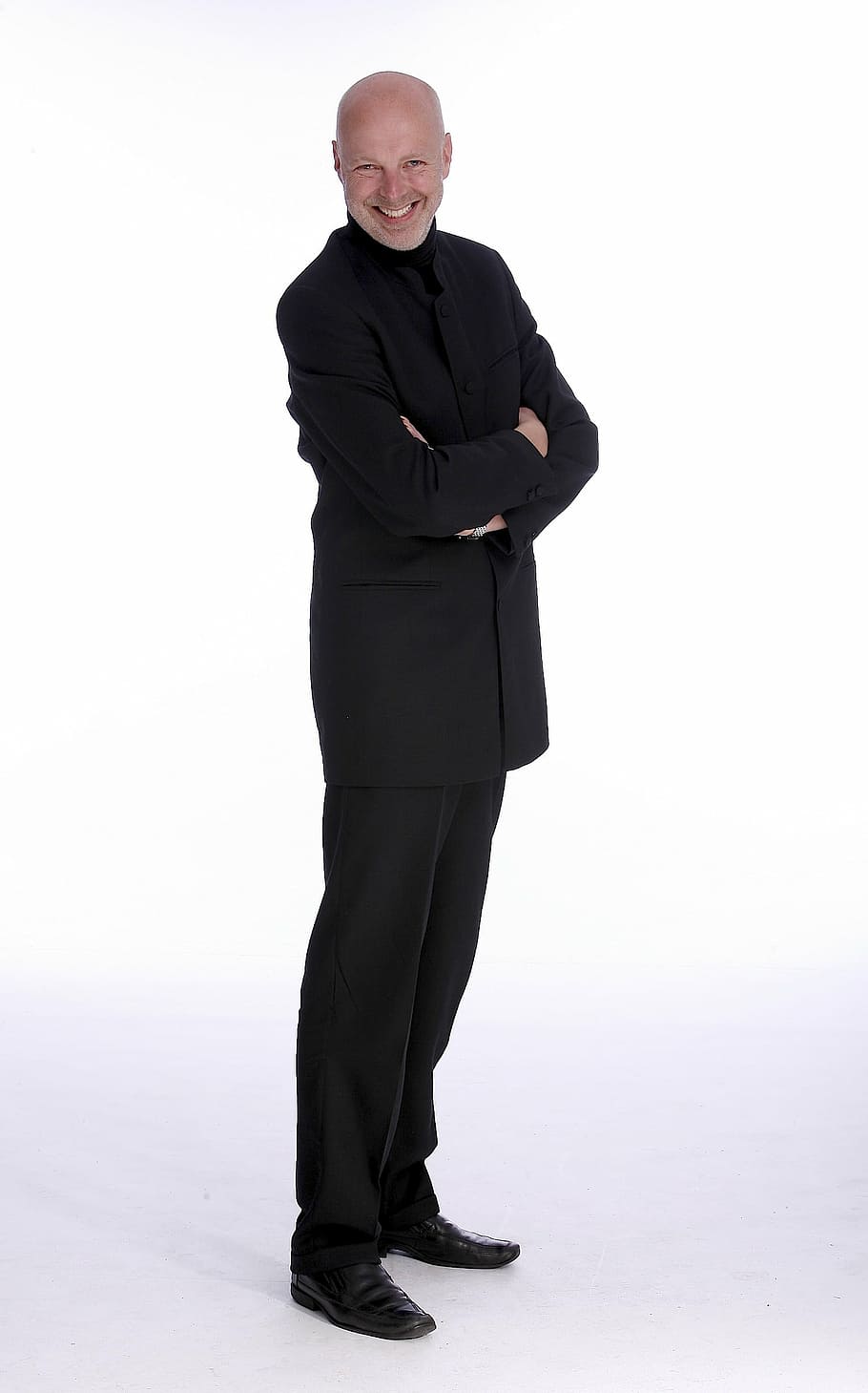 smiling man wearing black suit jacket, businessman, germany, laughing