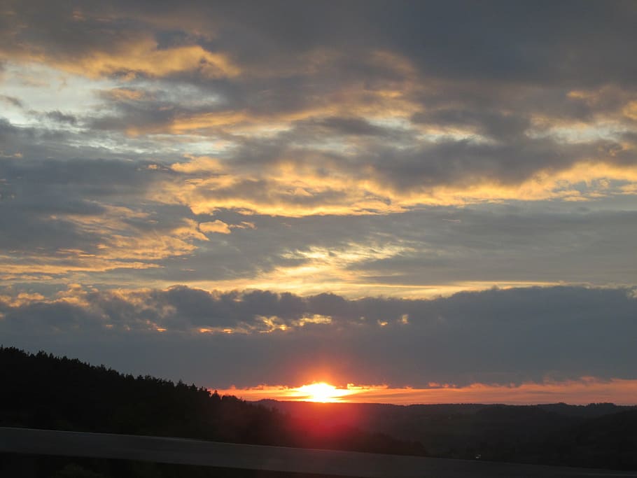 sun, sunset, on the go, setting sun, clouds, orange, yellow HD wallpaper