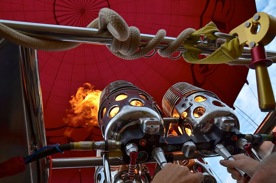 hot air balloon ride, representation, fire, human hand, red
