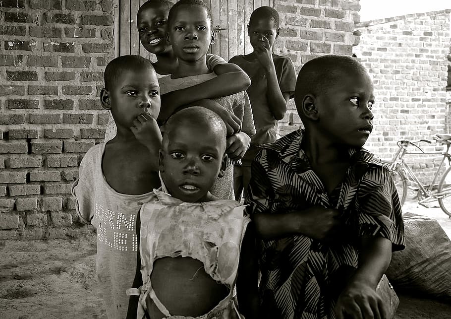 grayscale photo of children, Uganda, Africa, Poverty, developing country
