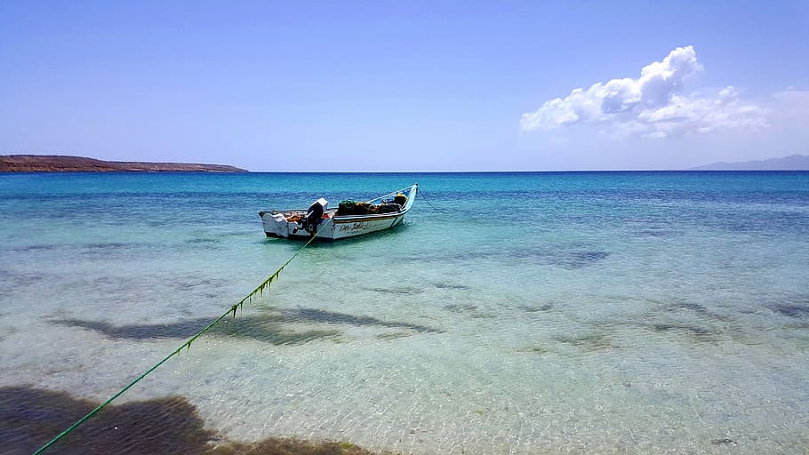 boat on body of water under white clouds and blue sky, anchored HD wallpaper