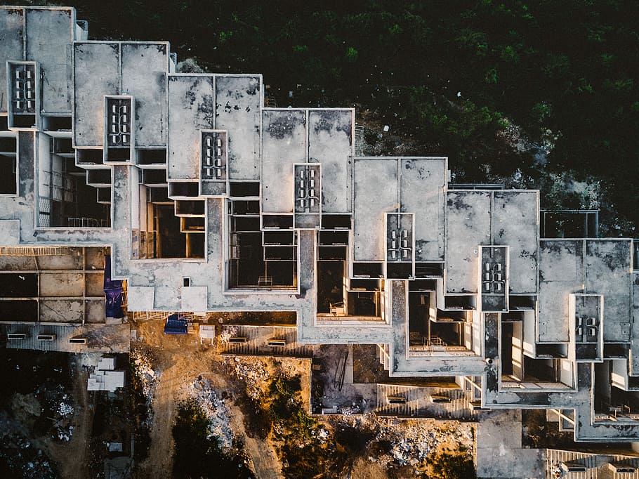 top view of building, aerial view of concrete building near body of water HD wallpaper