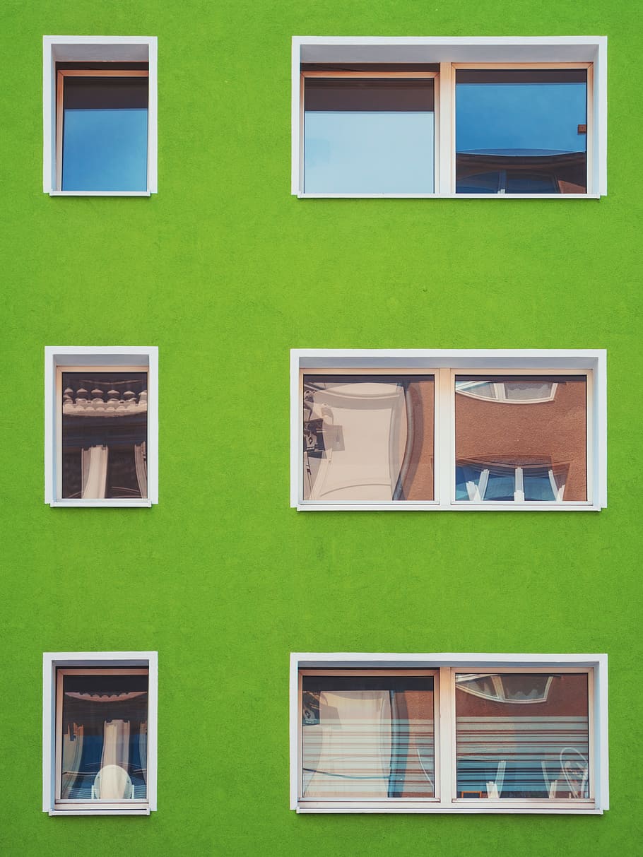 architectural photography of green house with windows, green concrete building with white frame window HD wallpaper